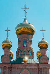 Top of the Orthodox Church. Golden domes and crosses on the church