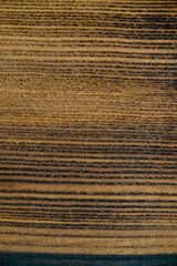 Wooden texture of an old dark burnt board for design work and home decoration