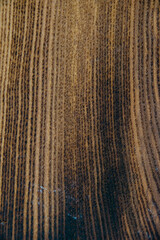 Wooden texture of an old dark burnt board for design work and home decoration