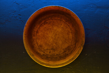 Empty bowl on dark background with copy space