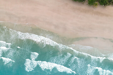 Naklejka na ściany i meble Summer tropical Beach sand copy space as a Beautiful sea waves background,Top view