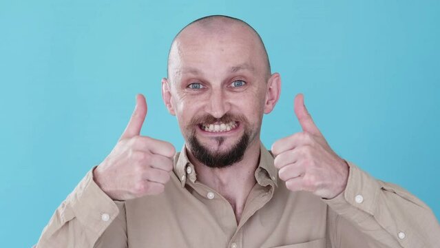 Like gesture. Great idea. Boomerang motion. Perfect choice. Offer approval. Positive reaction. Satisfied pleased funny guy accepting with thumbs up gif loop isolated on blue.