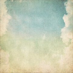 old grunge background canvas paper texture with blue sky and white clouds abstract scenery