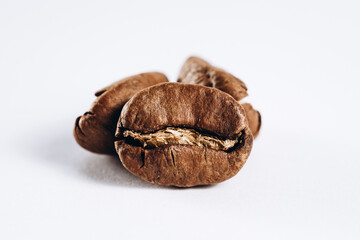 roasted coffee beans isolated on white background with shadow