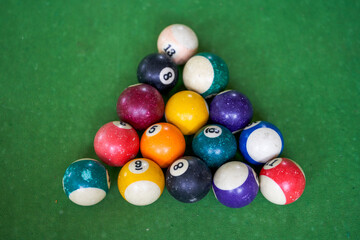 Close-up of american billiards on a pool table - obrazy, fototapety, plakaty