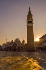 Fototapeta na wymiar The sun rising over St Mark's Square, Venice, Italy