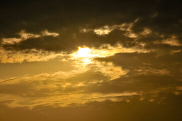 sun ray is go down and amazing dramatic orange cloud