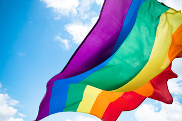 Colorful LGBT flag blows in the breez.