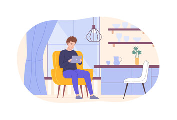 Businessman sitting in armchair working with laptop computer.