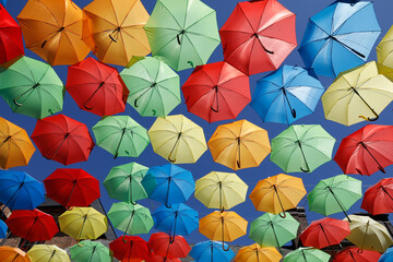 Fototapeta na wymiar Umbrellas over a street in France