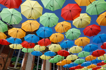Umbrellas over a street in France