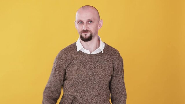 Small size gesture. Little bit. Boomerang animation. Measure something. Funny hopeful man asking for minimum amount please gif loop isolated on yellow copy space.