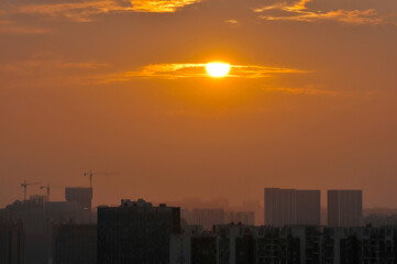Fototapeta na wymiar sun ray is go down and amazing dramatic orange cloud