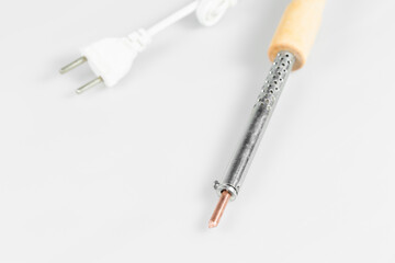 Electric soldering iron isolated on a white background