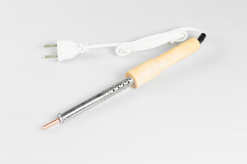 Electric soldering iron isolated on a white background