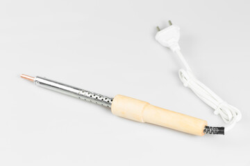 Electric soldering iron isolated on a white background