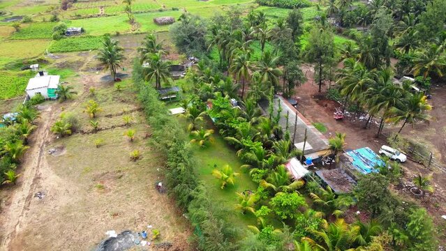 well on the back yeard india mumbai greenary village vasi beach rajodi drone shot village well.