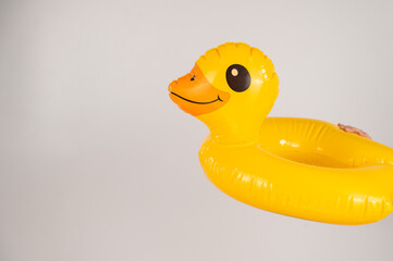 Children's inflatable circle duck on a white background. 