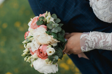 bride and groom holding hands