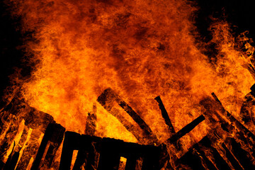 Fire flames background. Red hot flames of fire