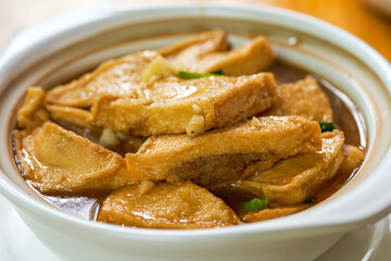 A delicious Chinese dish, braised tofu and stuffed meat in claypot