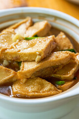 A delicious Chinese dish, braised tofu and stuffed meat in claypot