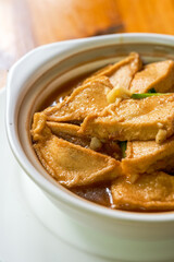 A delicious Chinese dish, braised tofu and stuffed meat in claypot