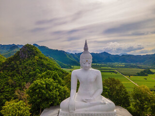 Buddha statue on mountain.white buddha statue
