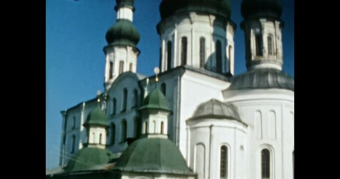 Assumption Yelets Monastery Chernihiv in summer Ukraine. Christian church. Orthodox Christian cathedral religion temple architecture on blue sky. Vintage color film. Retro 80s archive. 1980s-1990s