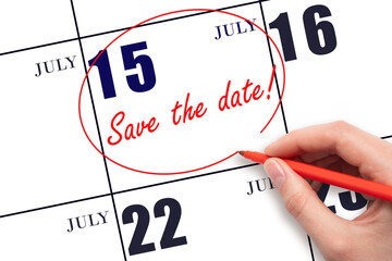 Hand drawing red line and writing the text Save the date on calendar date July 15.