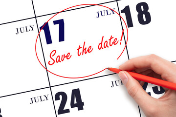 Hand drawing red line and writing the text Save the date on calendar date July 17.