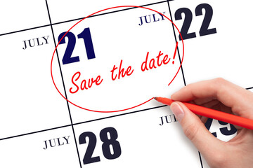 Hand drawing red line and writing the text Save the date on calendar date July 21.