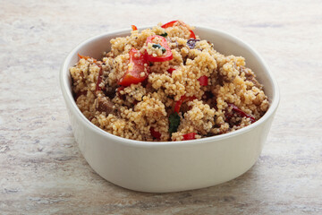 Arabic cous cous with meat and tomato