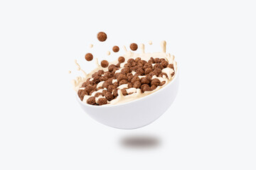 breakfast snacks fall into bowl with milk. File contains clipping path