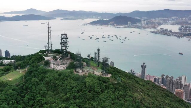 Top of Castle Peak facing Castle Peak Bay. Aerial shot of tower fic in the top of the peak.