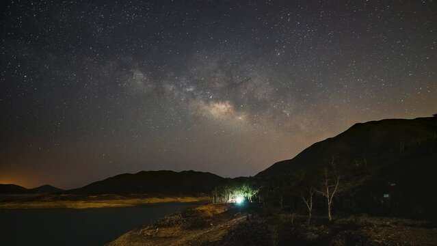 Aerial Time-lapse shot of beautiful scenery of island and galaxy star view. 