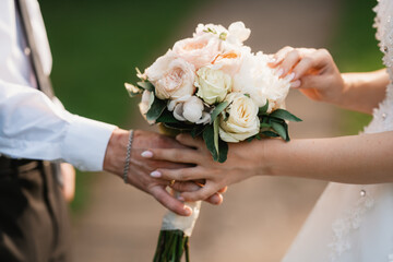 bride and groom holding hands