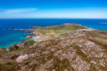 Aerial view of Crocknasleigh and the Murder Hole beach, officially called Boyeeghether Bay in County Donegal, Ireland