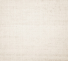 Fabric canvas woven texture background in pattern in light beige cream brown color gauze linen blank.