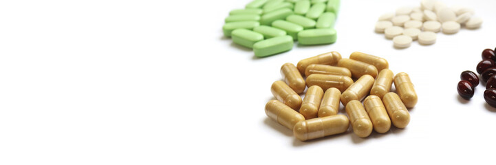 Vitamins and supplements on a light background. Banner for the website of a medical institution, laboratory or pharmacology, pharmacy or online medicine store