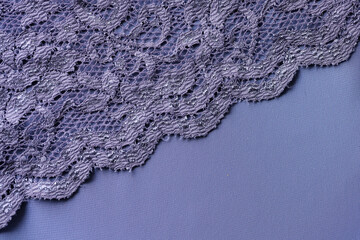 Fototapeta premium Blue lace fabric with floral print pattern background