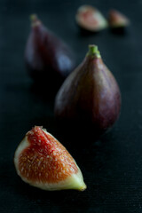 Fresh figs on the black table