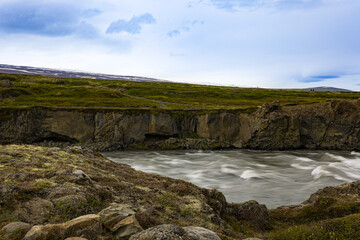 Flow of water in the river Skjálfandafljót near Goðafoss Waterfall close to the second largest city in Iceland, Akureyri.