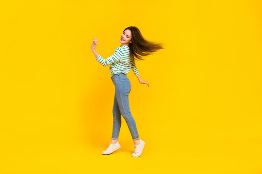 Full size photo of charming good mood stunning lady dancing enjoy her hobby isolated on yellow color background