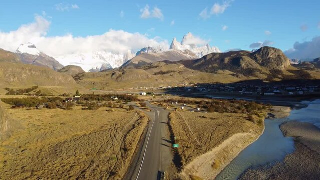 El Chalten, Argentina: Aerial drone footage of the famous El Chalten town by the Fitz Roy mountain peak in Patagonia in Argentina. Shot with an upward motion