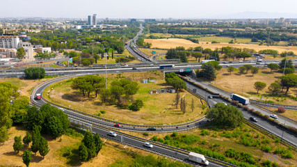 Aerial view of the Great Ring Junction in Rome, Italy. It's a long orbital motorway that encircles...