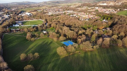 Aerial view of a rural town with houses and countryside. Taken in Lancashire England. 