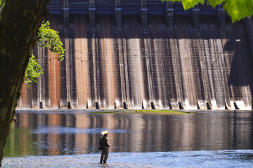 Fisherman trying his luck on the North Fork River below the Norfork Dam in Salesville, Arkansas 