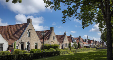 Fototapeta na wymiar Houses. Street. Village at Schiermonnikoog waddeneiland. Netherlands. Waddenzee. Coast