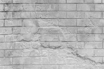 Old grey broken brickwork wall texture cement gray concrete background